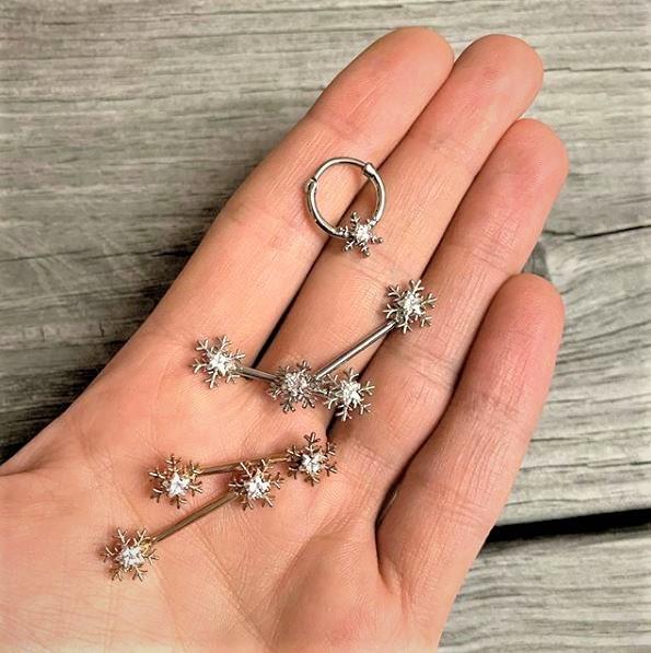 BodyCandy 16G 3/8 Clear Gem Holiday Snowflake Septum Clicker — lifestyle context