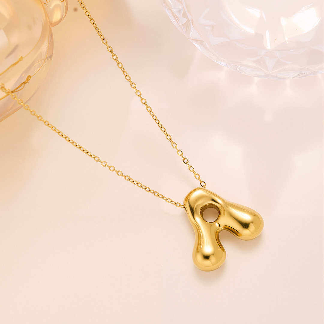 SORI STYLE Initial Bubble Letter Necklace — lifestyle context