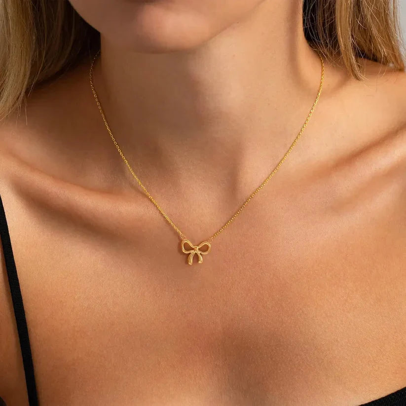 SORI STYLE Elegant Bow Pendant Necklace.. — detail close-up