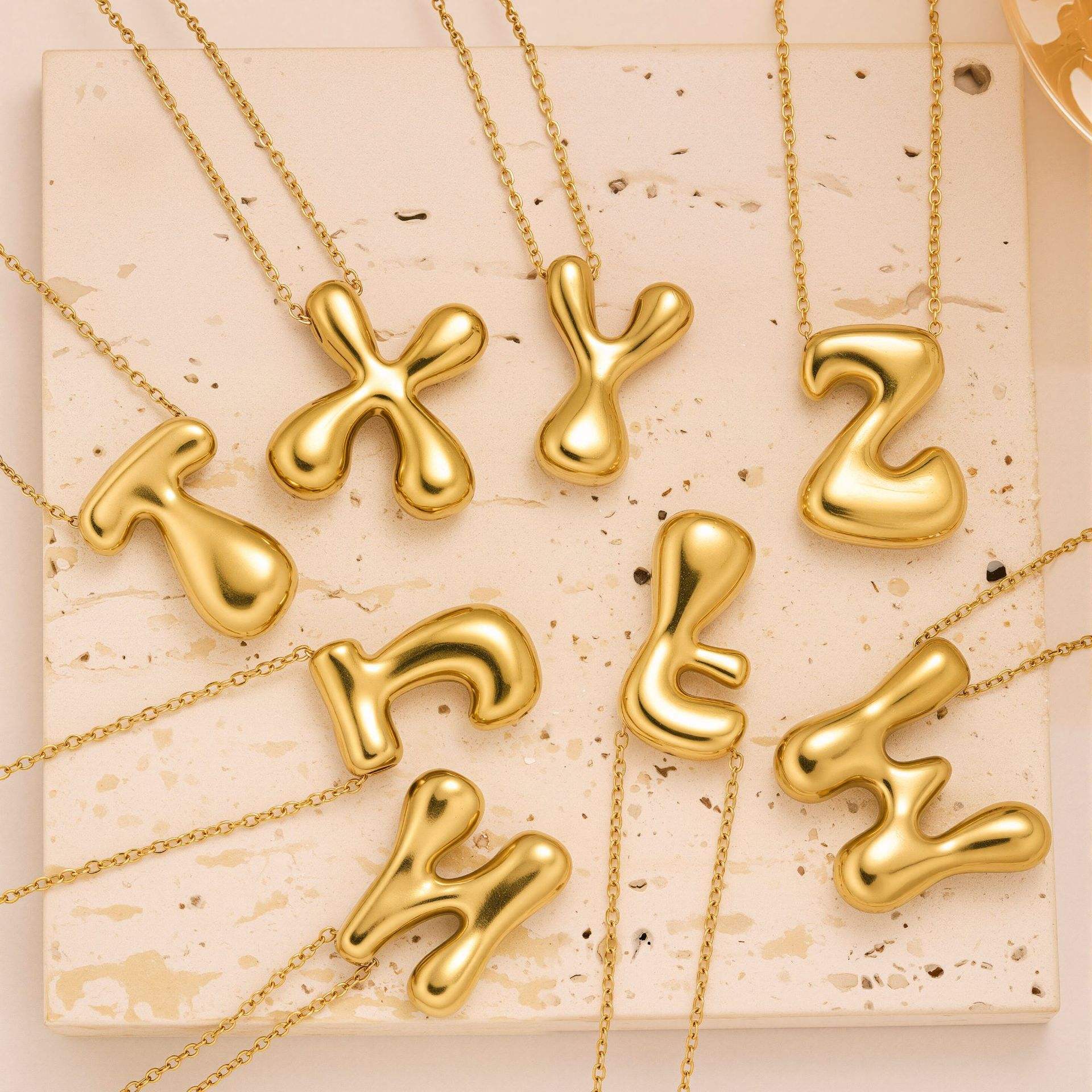 SORI STYLE Initial Bubble Letter Necklace — side view