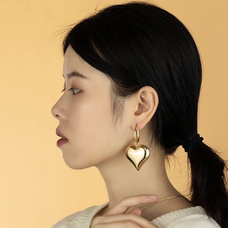 SORI STYLE Chunky Heart Hoop Earrings — lifestyle context