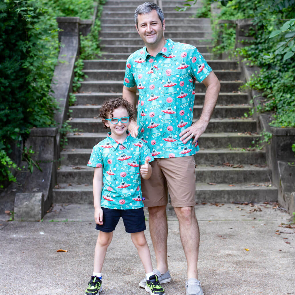 Princess Awesome & Boy Wonder "Beam Me Up, Kitty" Cats in Space Saucers Short Sleeve Polo Shirt — lifestyle context