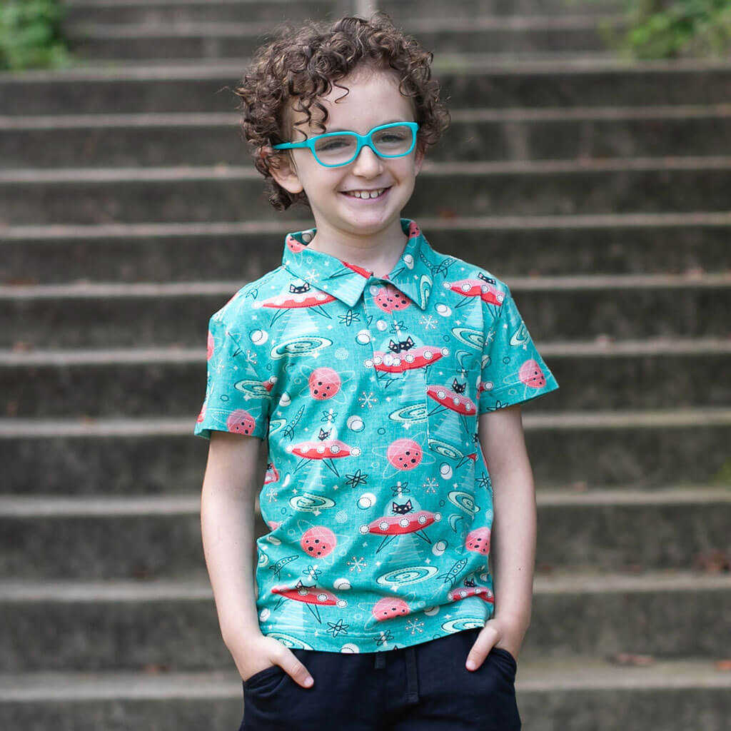 Princess Awesome & Boy Wonder "Beam Me Up, Kitty" Cats in Space Saucers Short Sleeve Polo Shirt — main product shot