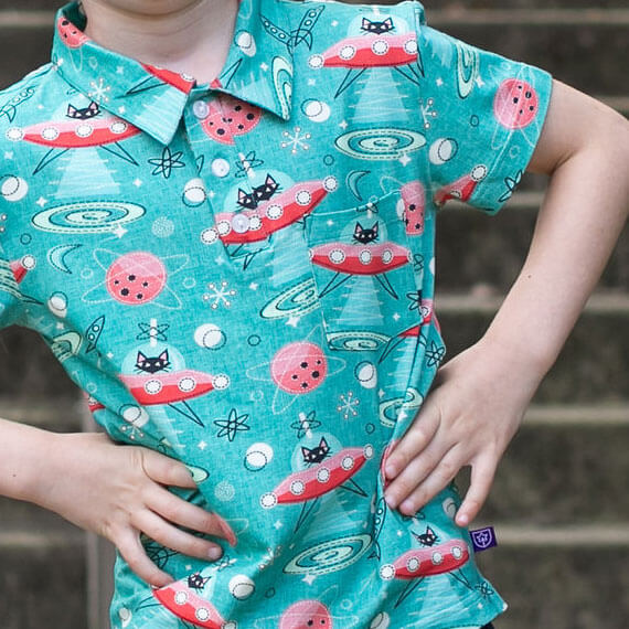 Princess Awesome & Boy Wonder "Beam Me Up, Kitty" Cats in Space Saucers Short Sleeve Polo Shirt — detail close-up