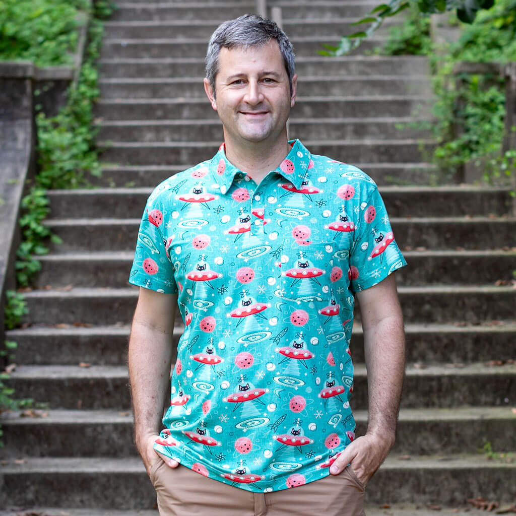 Princess Awesome & Boy Wonder Adult "Beam Me Up, Kitty" Cats in Space Saucers Short Sleeve Polo Shirt — main product shot