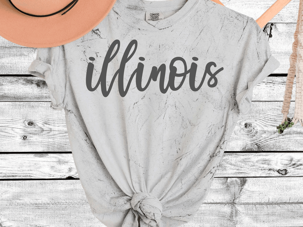 A Blessed Texas Mess Boutique Comfort Color Colorblast Tie Dye Spring State Shirts — A Blessed Texas Mess Boutique branding close-up