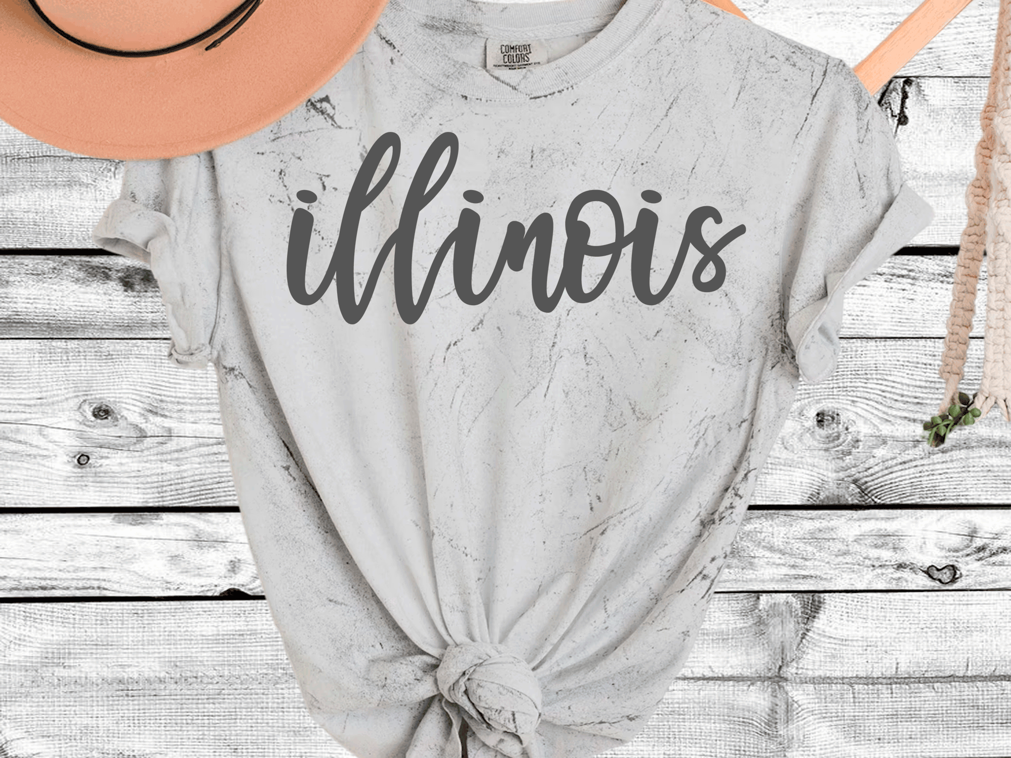 A Blessed Texas Mess Boutique Comfort Color Colorblast Tie Dye Spring State Shirts — A Blessed Texas Mess Boutique branding close-up