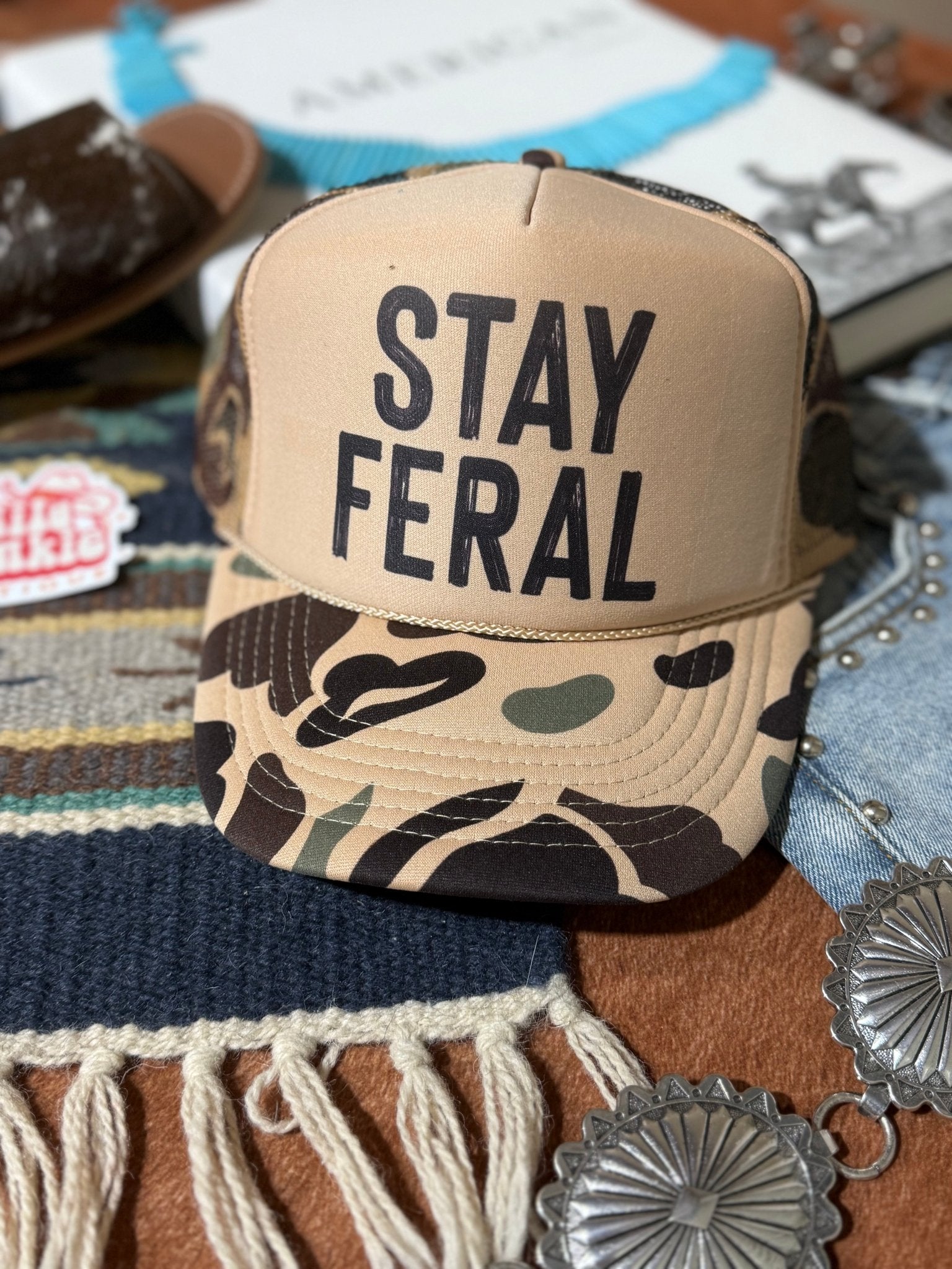 Wild Junkie Stay Feral Camo Trucker Hat — main product shot