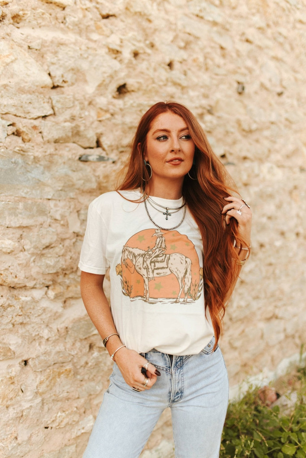 Wild Junkie Sunset Cowgirl Rider Graphic Tee — back view