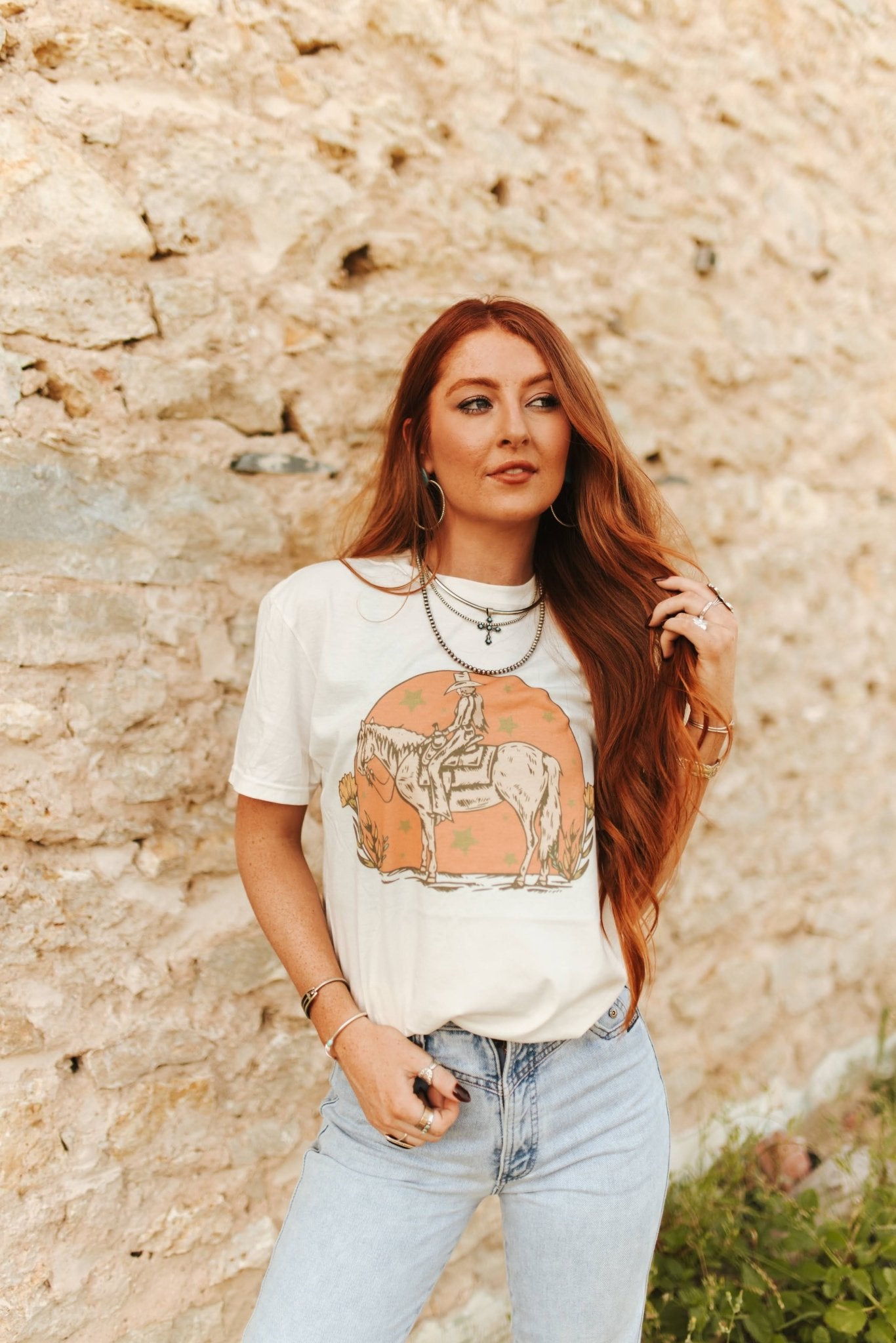 Wild Junkie Sunset Cowgirl Rider Graphic Tee — back view