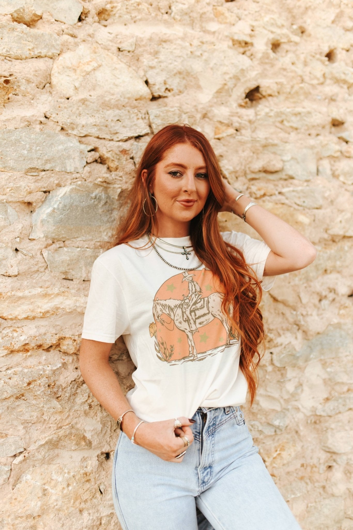 Wild Junkie Sunset Cowgirl Rider Graphic Tee — main product shot