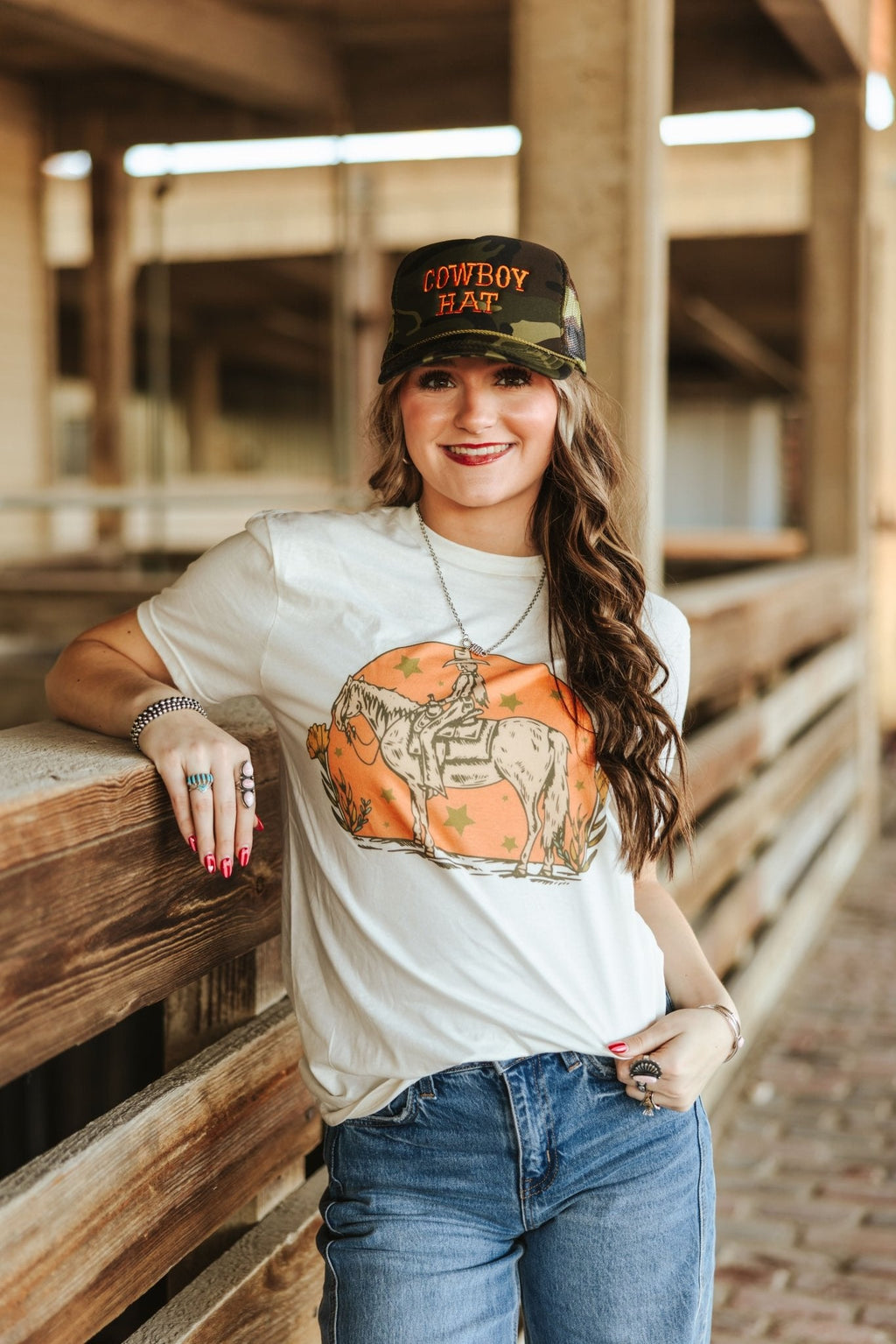 Wild Junkie Sunset Cowgirl Rider Graphic Tee — lifestyle context