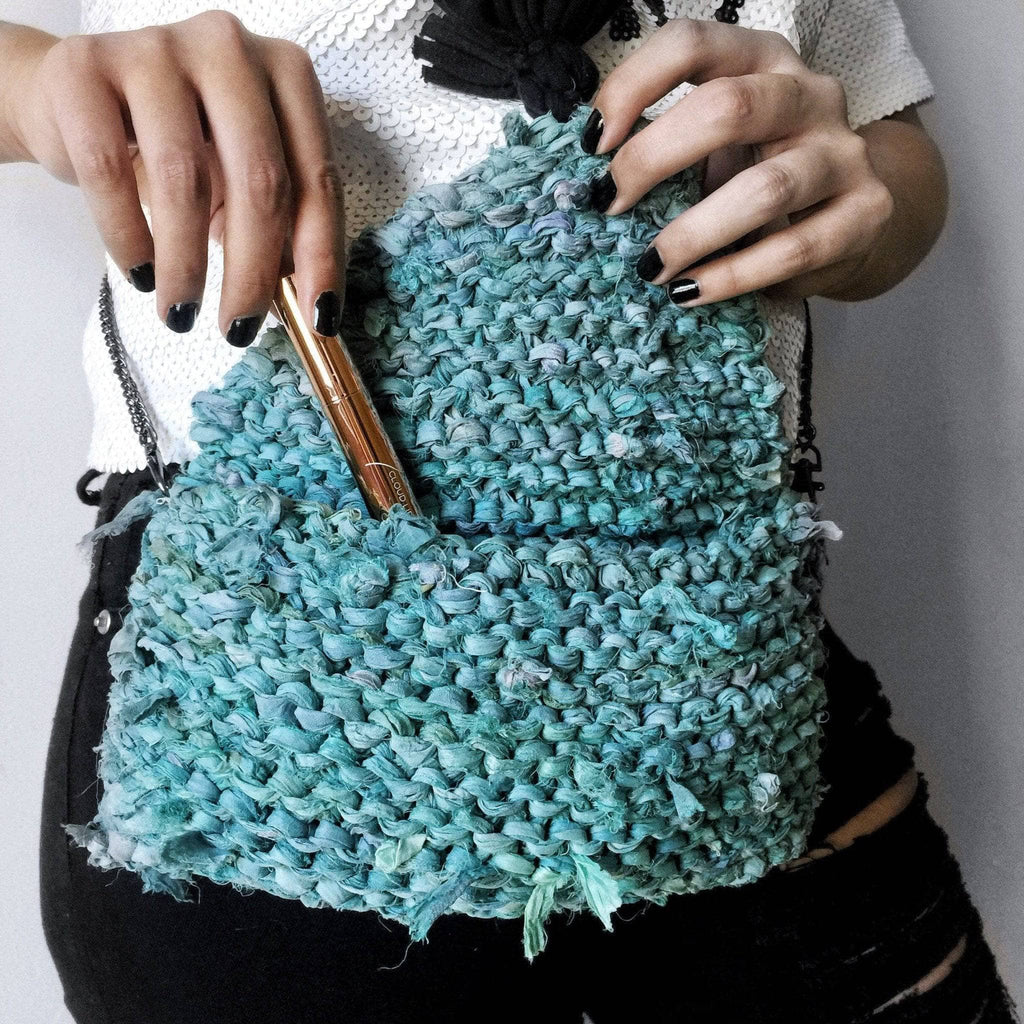 Darn Good Yarn Tasseled Sari Silk Clutch Knit Kit — Darn Good Yarn branding close-up