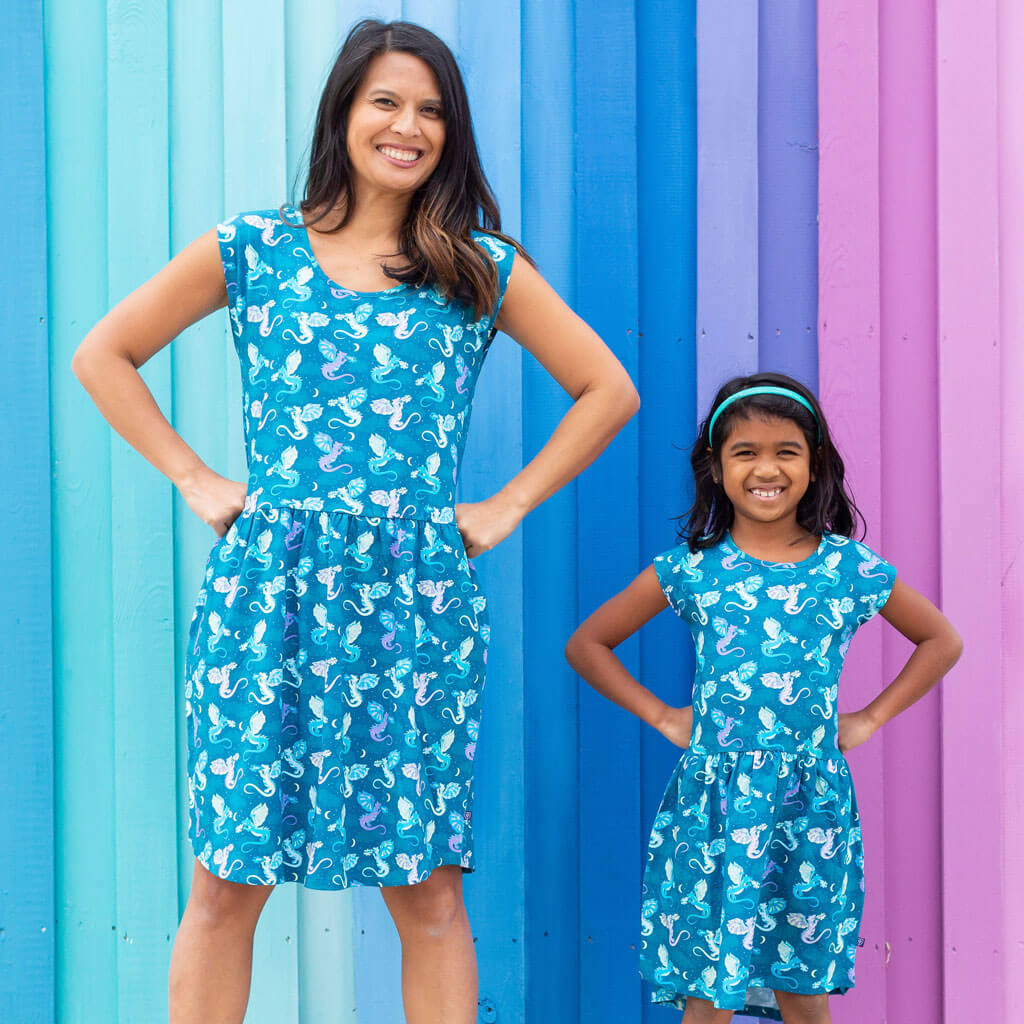 Princess Awesome & Boy Wonder Adult "Slay All Day" Dragons Cap Sleeve Dress with Pockets — lifestyle worn / used context