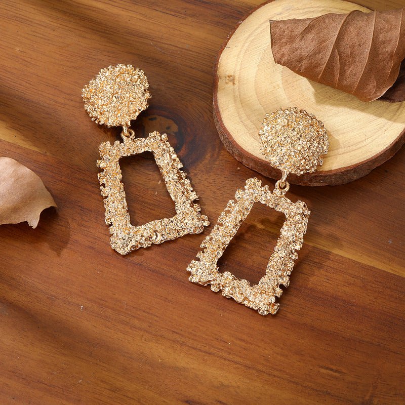 Mariam's Collection Trapezoid Dangle Earrings with Carved Texture (MAC322) — Mariam's Collection branding close-up