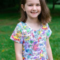 Princess Awesome & Boy Wonder "Staff Meeting" Rainbow Music Notes Super Twirler Dress with Pockets — main product shot