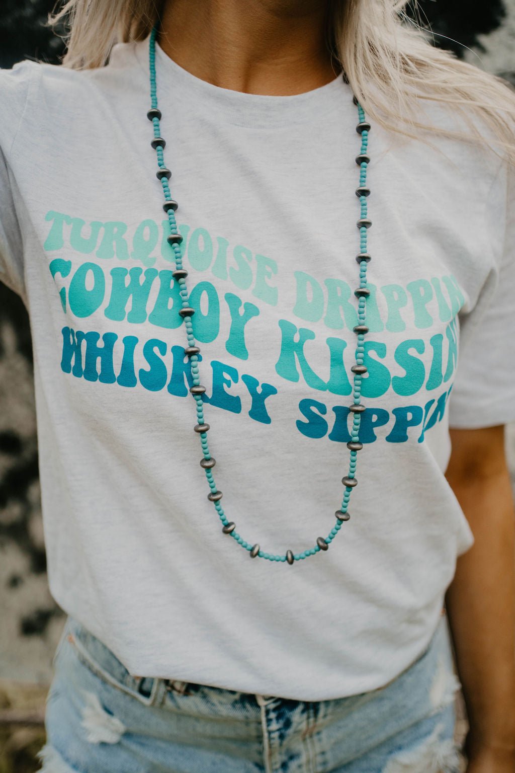Wild Junkie Turquoise Drippin' Western Graphic Tee — lifestyle worn / used context
