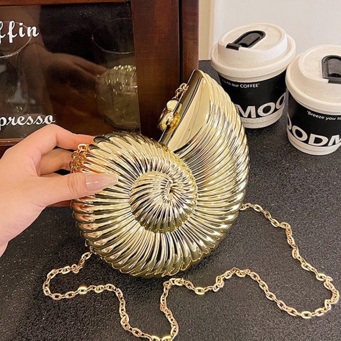 Mariam's Collection Unique Chic Conch Shell Inspired Clutch Bag (MAC311) — flat-lay composition