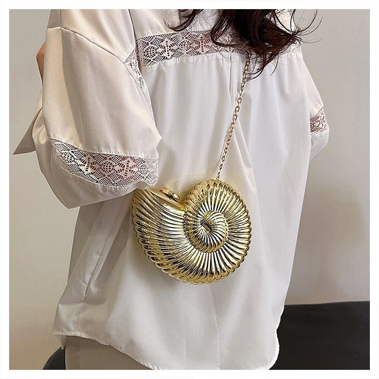 Mariam's Collection Unique Chic Conch Shell Inspired Clutch Bag (MAC311) — lifestyle context
