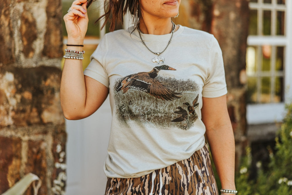 Wild Junkie Vintage Duck Graphic Tee — Wild Junkie branding close-up