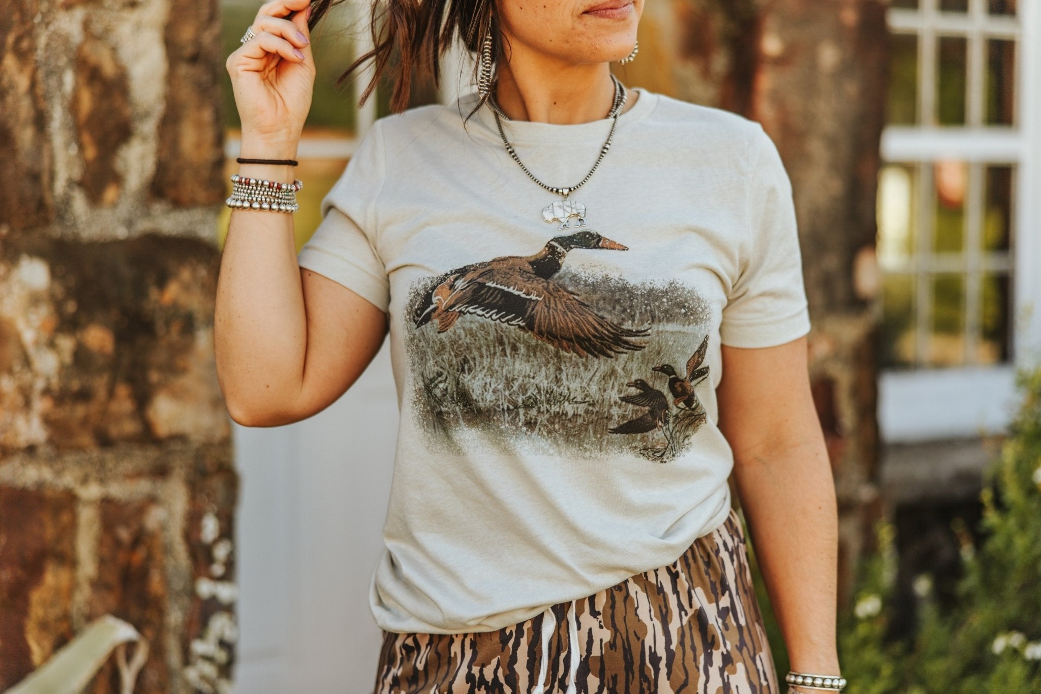 Wild Junkie Vintage Duck Graphic Tee — Wild Junkie branding close-up