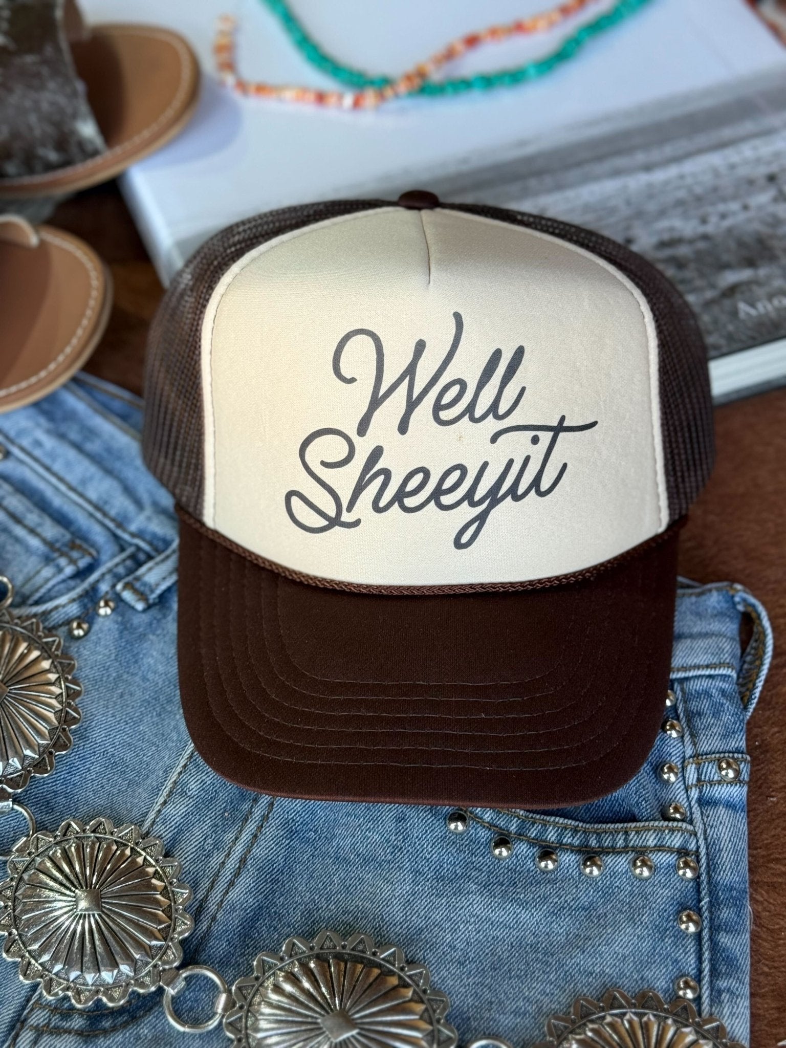 Wild Junkie Well Sheeyit Trucker Hat — lifestyle context