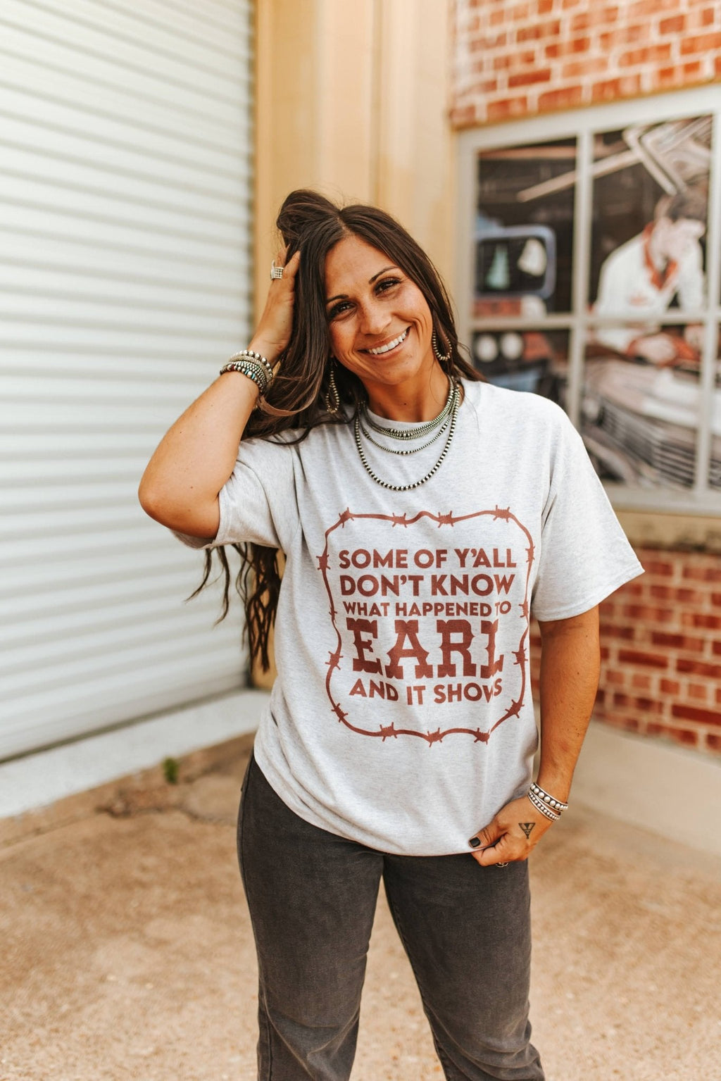 Wild Junkie What Happened To Earl Graphic Tee — Wild Junkie branding close-up