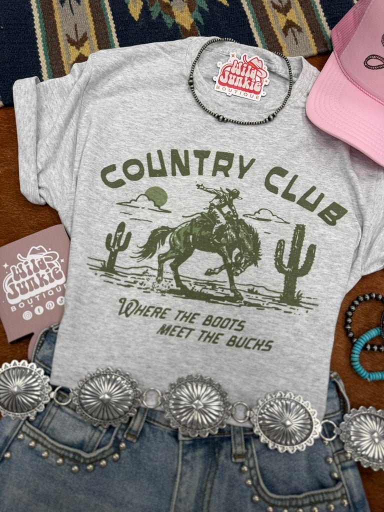 Wild Junkie Where The Boots Meet The Bucks Graphic Tee — Wild Junkie branding close-up