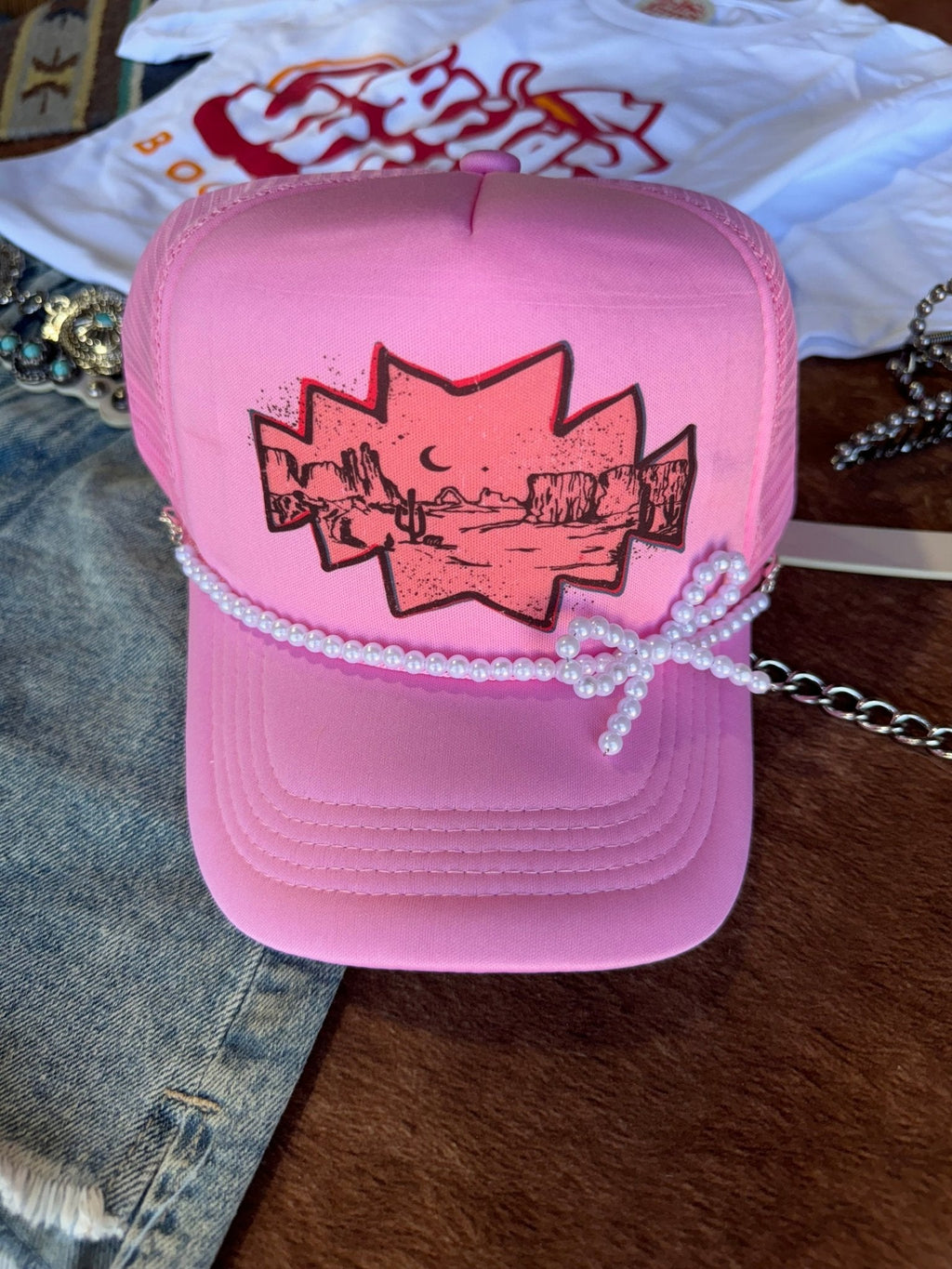 Wild Junkie White Pearl Bow Trucker Hat Chain — lifestyle context