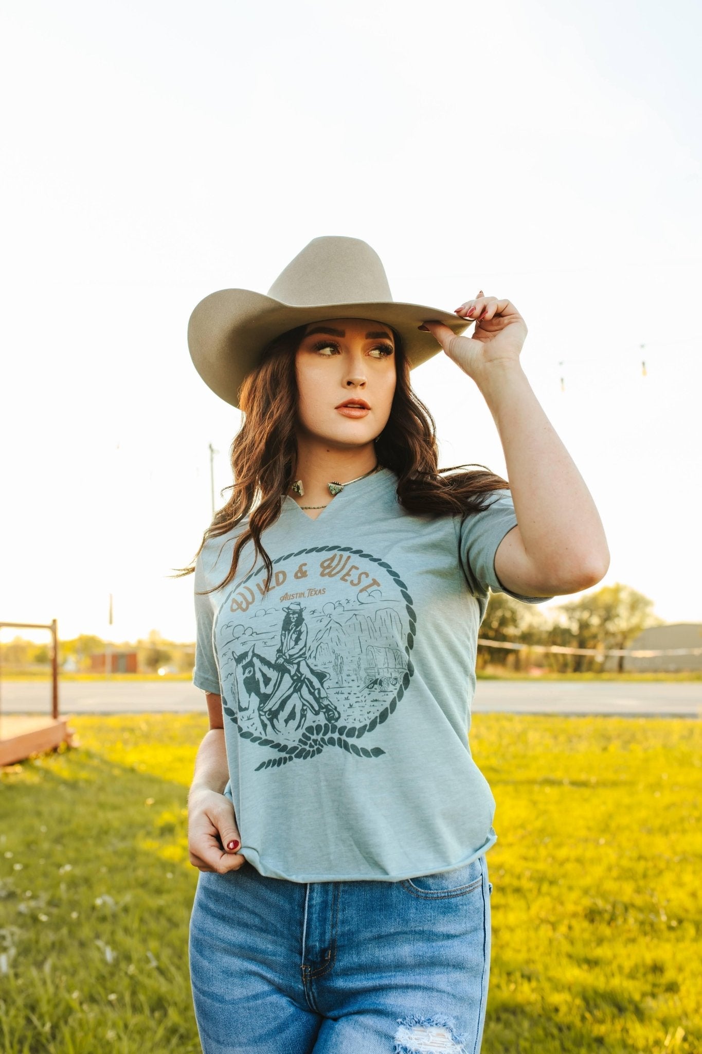 Wild Junkie Wild & West Raw Cut Hem and V-neck Graphic Tee — construction detail