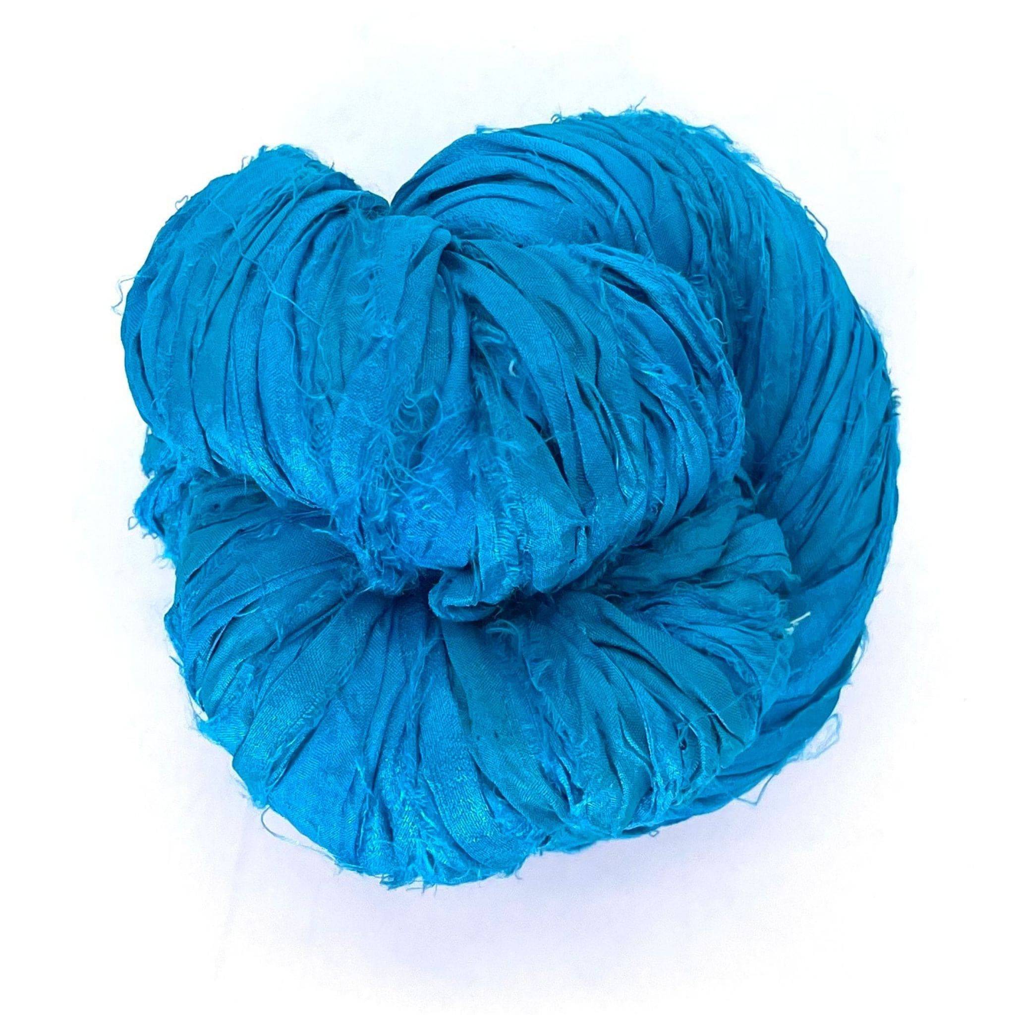 Darn Good Yarn Artisan Recycled Sari Ribbon – Sari Treasures in Every Strand — flat-lay composition