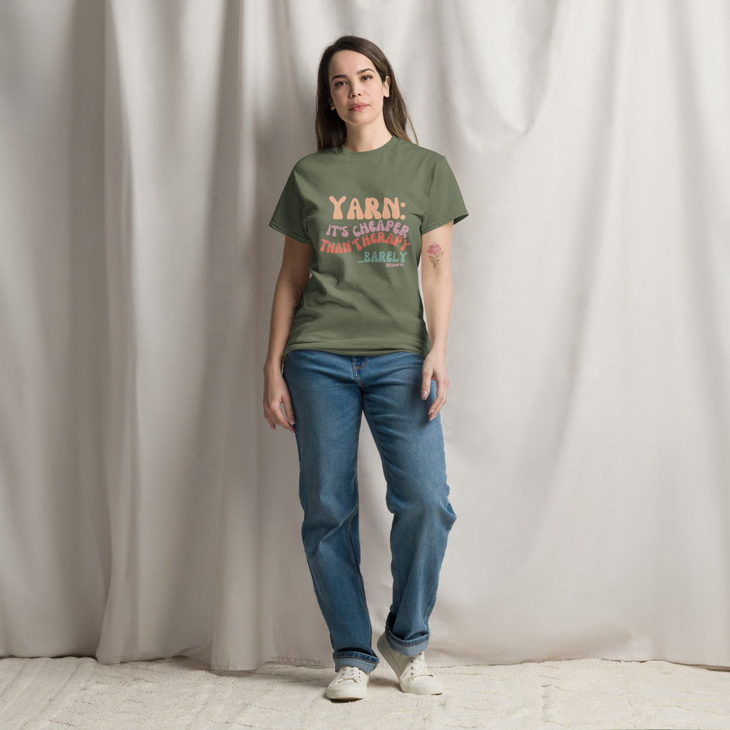 Darn Good Yarn Yarn: It’s Cheaper Than Therapy… Barely T-Shirt — Darn Good Yarn branding close-up