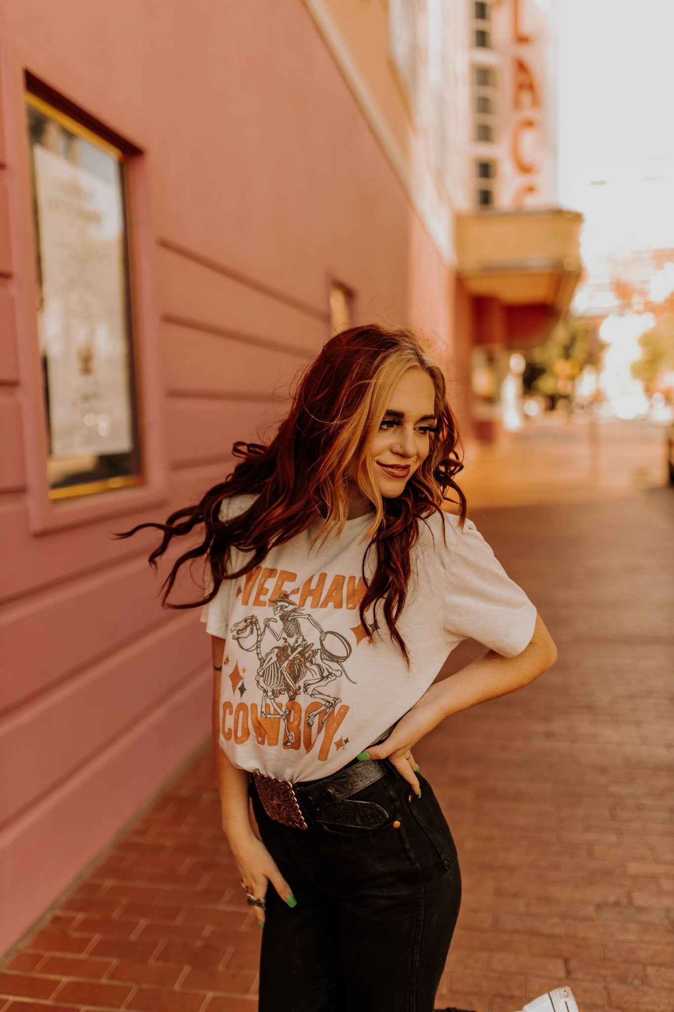 Wild Junkie Yee-Haw Skeleton Cowboy Graphic Tee — Wild Junkie branding close-up