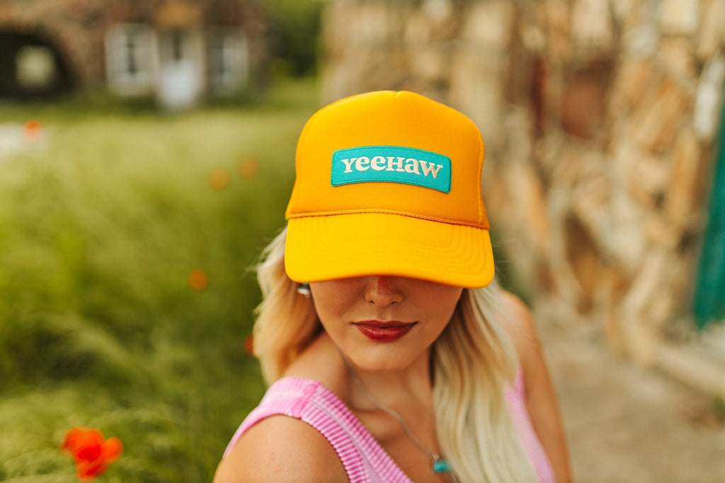 Wild Junkie YeeHaw Patch Trucker Hat — Wild Junkie branding close-up