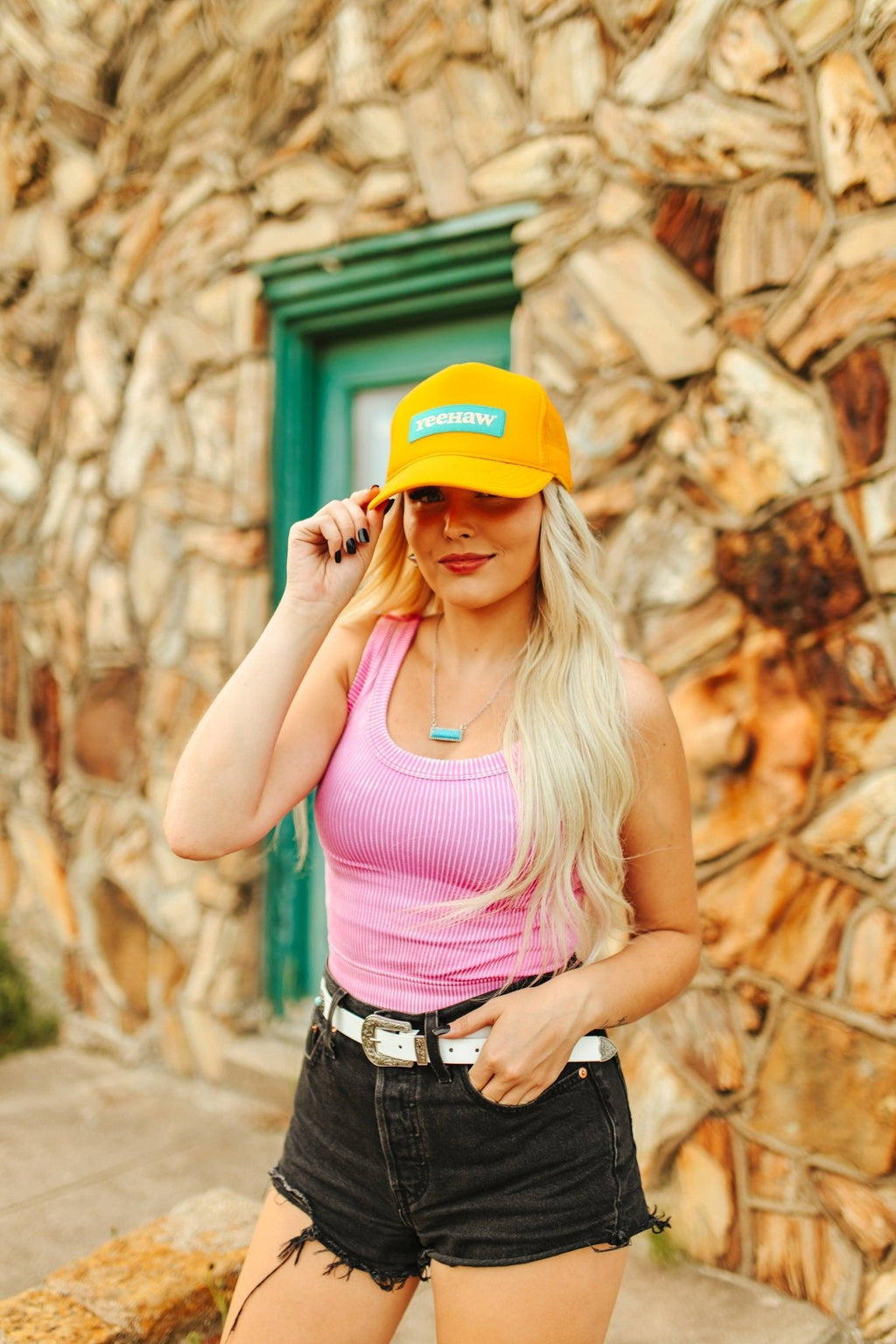 Wild Junkie YeeHaw Patch Trucker Hat — lifestyle worn / used context