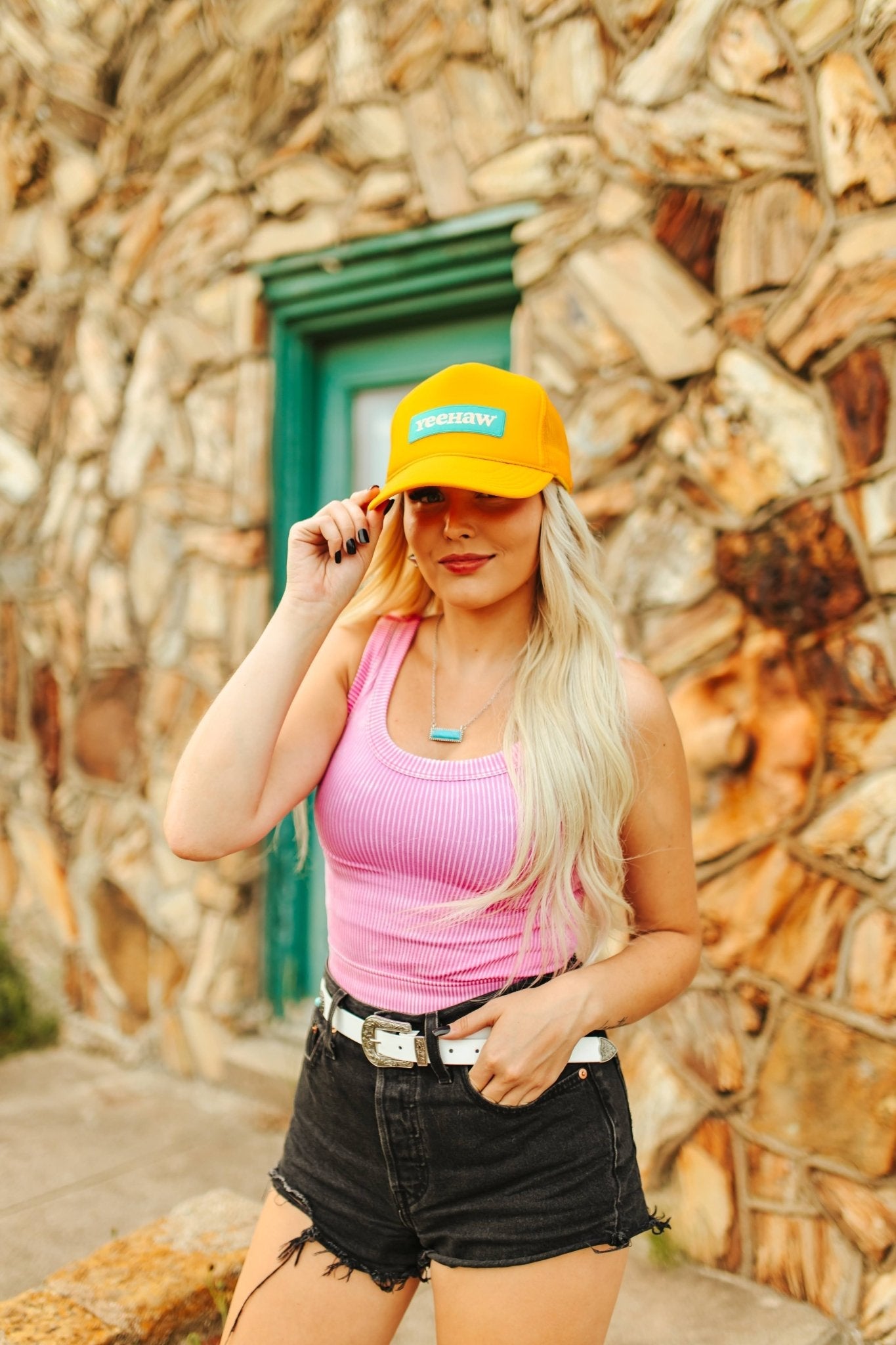 Wild Junkie YeeHaw Patch Trucker Hat — lifestyle worn / used context