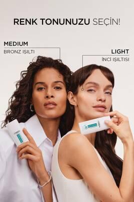L'Oreal Paris Bright Reveal Tinted Sunscreen Fluid SPF 50 - Dark Spot Corrector, Evens Skin Tone, Medium Tint, Daily Sun Protection