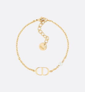 Petit CD Bracelet • Gold-Finish Metal with a White Resin Pearl