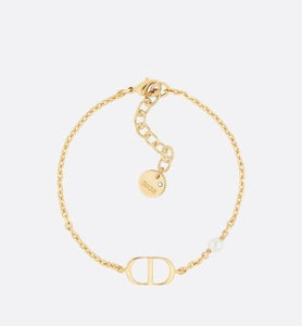 Petit CD Bracelet • Gold-Finish Metal with a White Resin Pearl