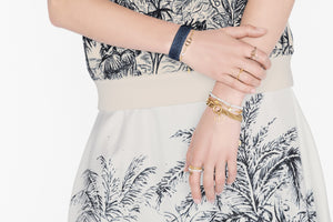 Petit CD Bracelet • Gold-Finish Metal with a White Resin Pearl