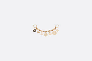 30 Montaigne Bag Charm • Gold-Finish Metal and Black Lacquer