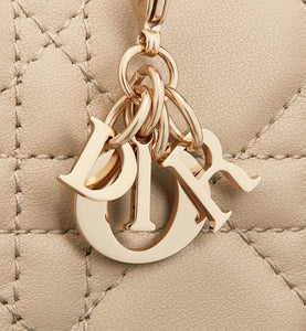 Small Lady Dior Voyageur Coin Purse • Sand-Colored Cannage Lambskin