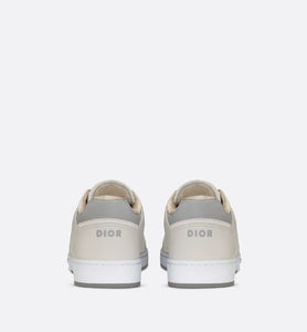 B27 Low-Top Sneaker • Cream and White Smooth Calfskin with Beige and Black Dior Oblique Jacquard