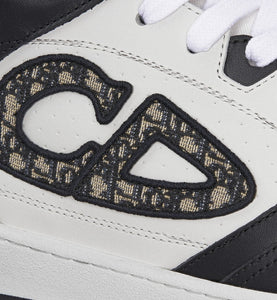 B57 Mid-Top Sneaker • Black and White Smooth Calfskin with Beige and Black Dior Oblique Jacquard
