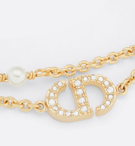 Petit CD Bracelet • Gold-Finish Metal with White Resin