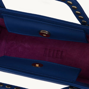 ASYMMETRICAL TOP HANDLE BAG