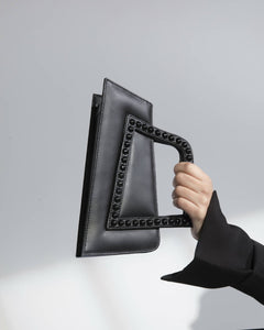 ASYMMETRICAL TOP HANDLE BAG