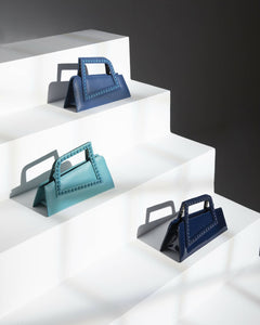 ASYMMETRICAL TOP HANDLE BAG