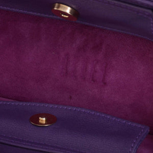 ASYMMETRICAL TOP HANDLE BAG